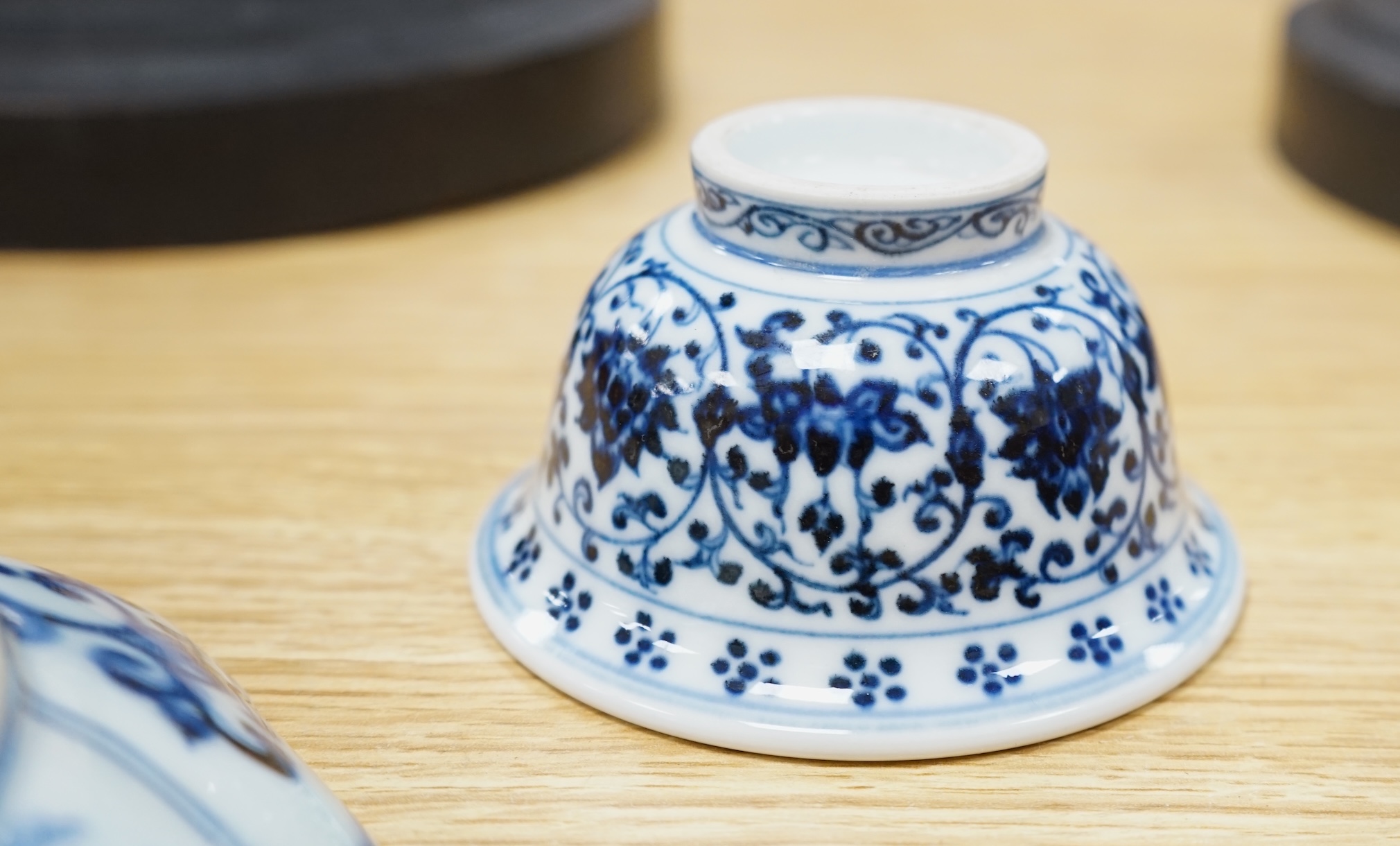 A Chinese copper red glazed dish, a blue and white bowl and a similar dish, bowl 22.5cm diameter. Condition - good